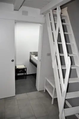 Letto o letti in una camera di Dock33 - Comfort Loft in Catania Center