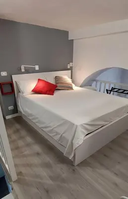 Letto o letti in una camera di Dock33 - Comfort Loft in Catania Center