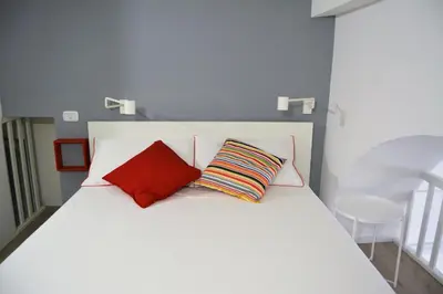 Letto o letti in una camera di Dock33 - Comfort Loft in Catania Center