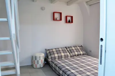 Letto o letti in una camera di Dock33 - Comfort Loft in Catania Center