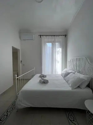 Letto o letti in una camera di Archome