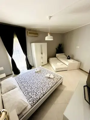 Letto o letti in una camera di Rooms Zecchino