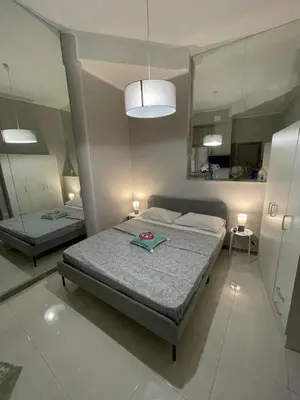 Letto o letti in una camera di Rooms Zecchino