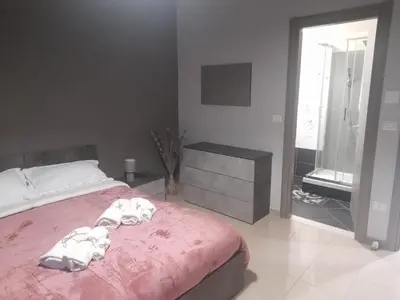 Letto o letti in una camera di Rooms Zecchino