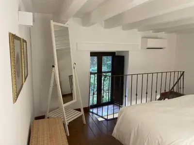 Letto o letti in una camera di Ortigia_corte d'avolio