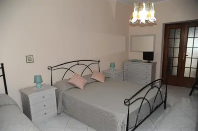 Letto o letti in una camera di Casa vacanze Il Nespolo