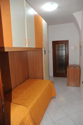 Letto o letti in una camera di Casa vacanze Il Nespolo