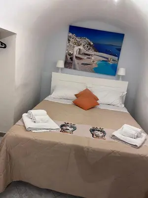 Letto o letti in una camera di IlGrecHouse
