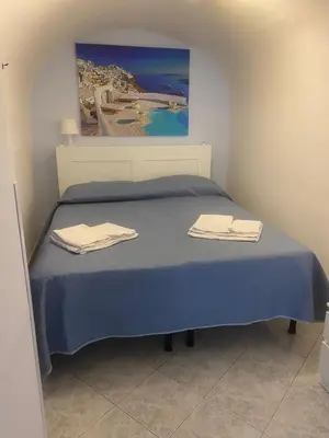 Letto o letti in una camera di IlGrecHouse