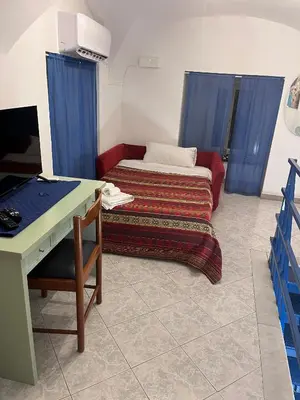 Letto o letti in una camera di IlGrecHouse