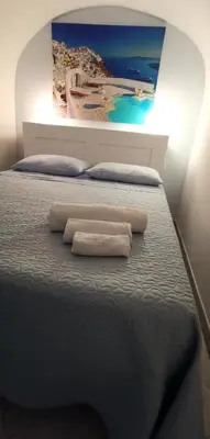 Letto o letti in una camera di IlGrecHouse