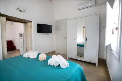 Letto o letti in una camera di Attico Roma