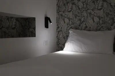 Letto o letti in una camera di La Regina del Duomo Catania Centro