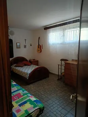 Letto o letti in una camera di Villa per famiglia
