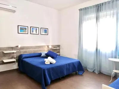 Letto o letti in una camera di Noto Rooms #2