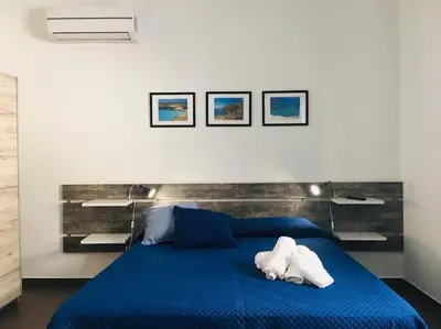 Letto o letti in una camera di Noto Rooms #2