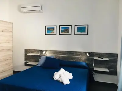 Letto o letti in una camera di Noto Rooms #2