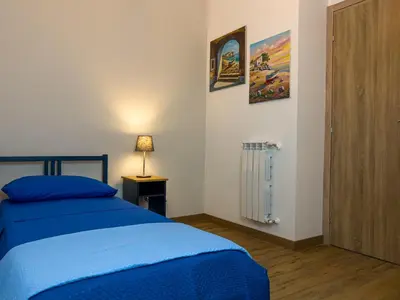 Letto o letti in una camera di Incanto Apartment
