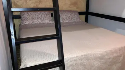 Letto o letti in una camera di Villa SAGA Fontane Bianche Siracusa