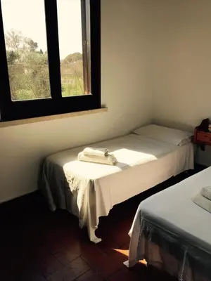 Letto o letti in una camera di Villa Mara