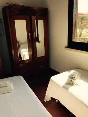 Letto o letti in una camera di Villa Mara