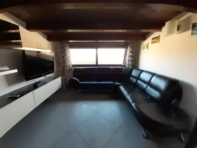 Area soggiorno di TONNARA HOUSE AND HOLIDAY