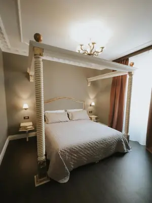 Letto o letti in una camera di B&B Locanda della Vittoria