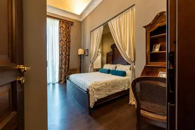 Letto o letti in una camera di B&B Locanda della Vittoria
