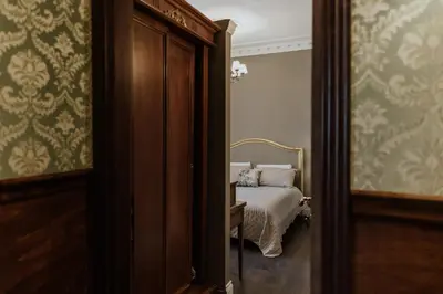 Letto o letti in una camera di B&B Locanda della Vittoria