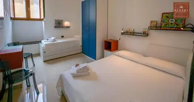 Letto o letti in una camera di Dimore Anna Maria -Casa Liberty-