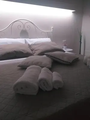 Letto o letti in una camera di Casetta Porta di Ligne