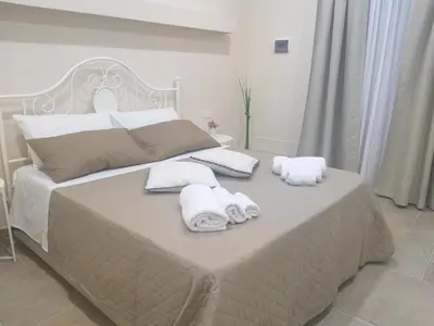 Letto o letti in una camera di Casetta Porta di Ligne