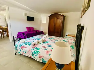 Letto o letti in una camera di Mandorlo Barocco
