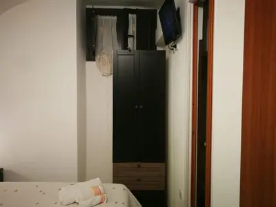 Letto o letti in una camera di La casetta di Ramona
