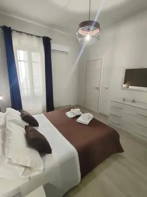Letto o letti in una camera di TAMA Home