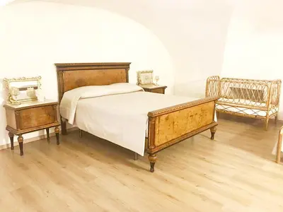 Letto o letti in una camera di Fortino Catania Center Apartment