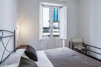 Letto o letti in una camera di Casa Amalfitana by Wonderful Italy