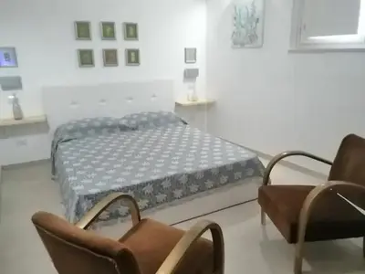 Letto o letti in una camera di Santa Maria Delle Grazie
