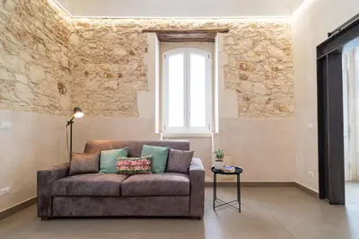 Area soggiorno di GuestHost - Santa Lucia Charming Apartment with Terrace