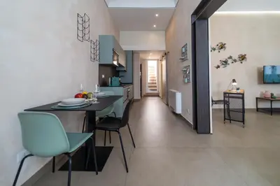 Cucina o angolo cottura di GuestHost - Santa Lucia Charming Apartment with Terrace