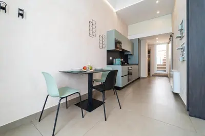 Cucina o angolo cottura di GuestHost - Santa Lucia Charming Apartment with Terrace