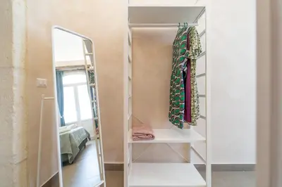 Letto o letti in una camera di GuestHost - Santa Lucia Charming Apartment with Terrace