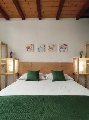 Letto o letti in una camera di Viridi Secret Oasis - Private Hot Tub