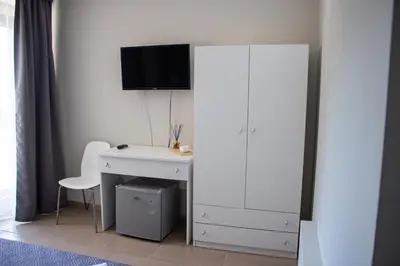 TV o dispositivi per l'intrattenimento presso Mirage Place B&B
