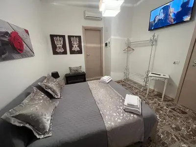 Letto o letti in una camera di Albemarooms