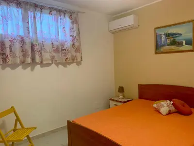 Letto o letti in una camera di Mareblu Marzamemi Apartments