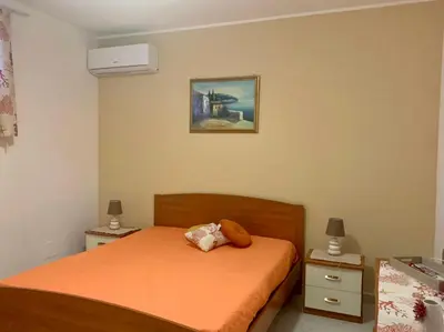 Letto o letti in una camera di Mareblu Marzamemi Apartments