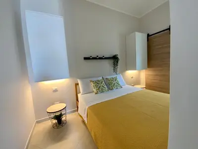 Letto o letti in una camera di Bedda Matri Dimora Siciliana