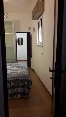 Letto o letti in una camera di Villa Giusy Fontane Bianche