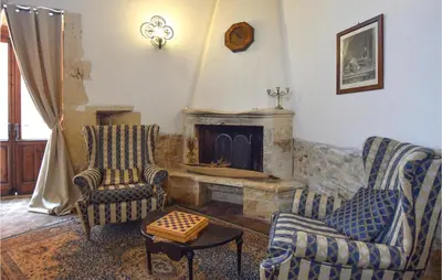 Area soggiorno di Lovely Apartment In Siracusa With Wifi